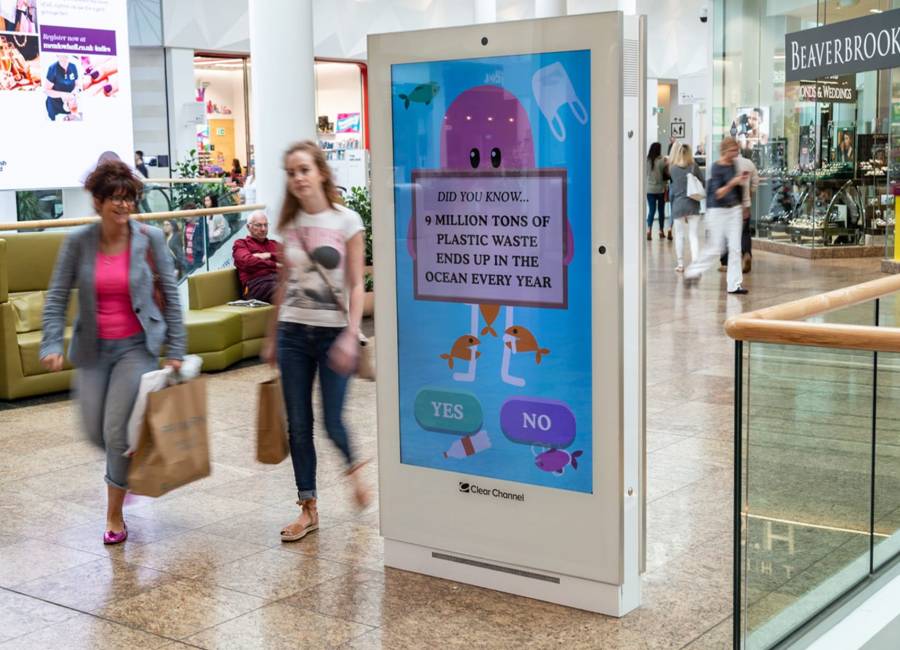 World Ocean Day interactive advert on digital screen in shopping mall with people