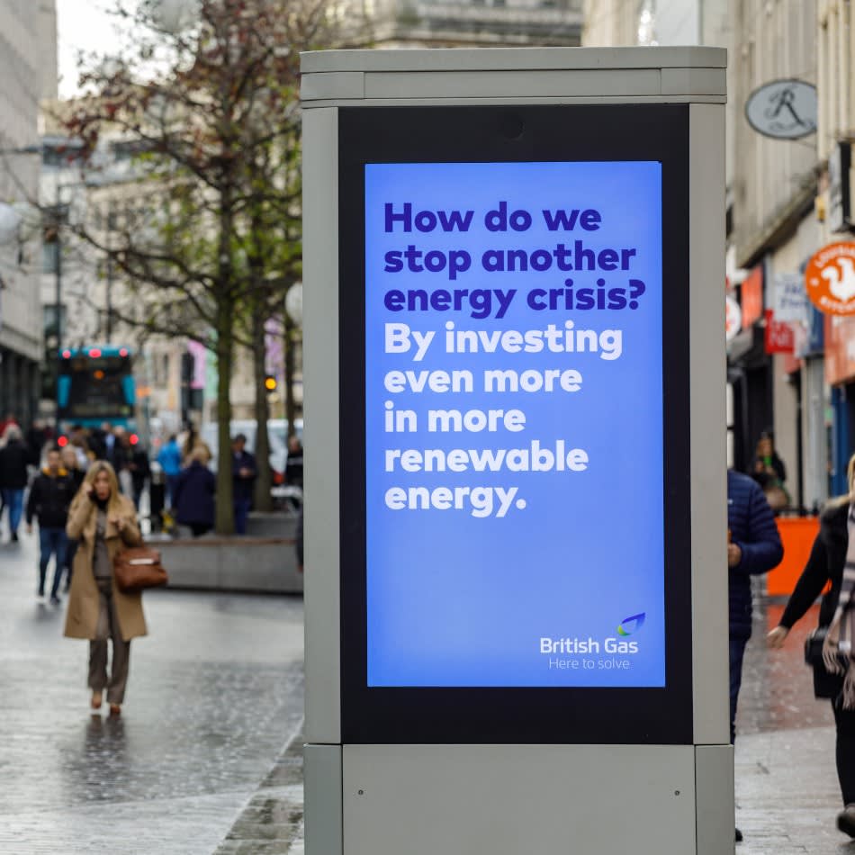 Digital screen on the high street showing British Gas ad