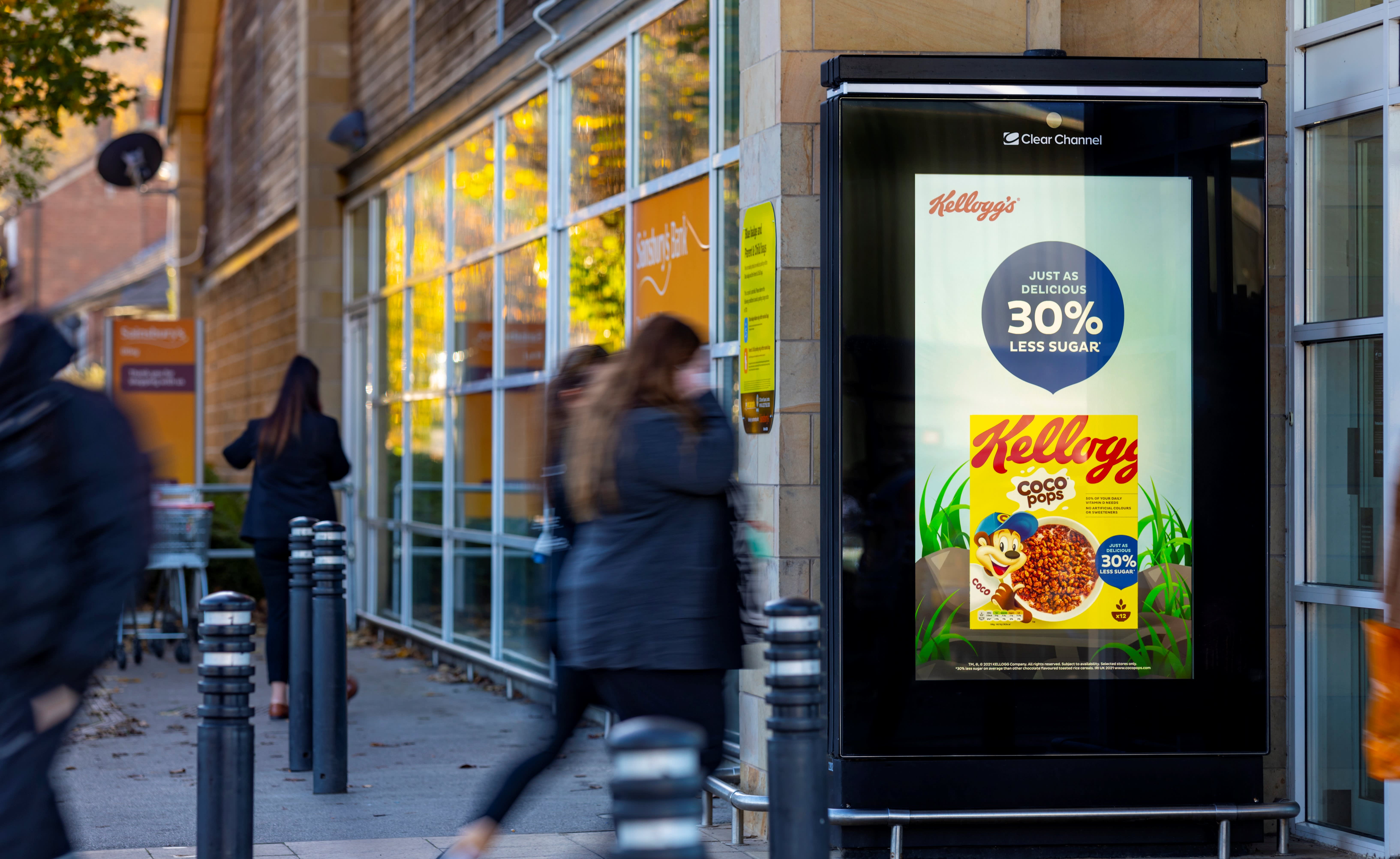 Kelloggs coco pops ad on digital screen outside Sainsbury's