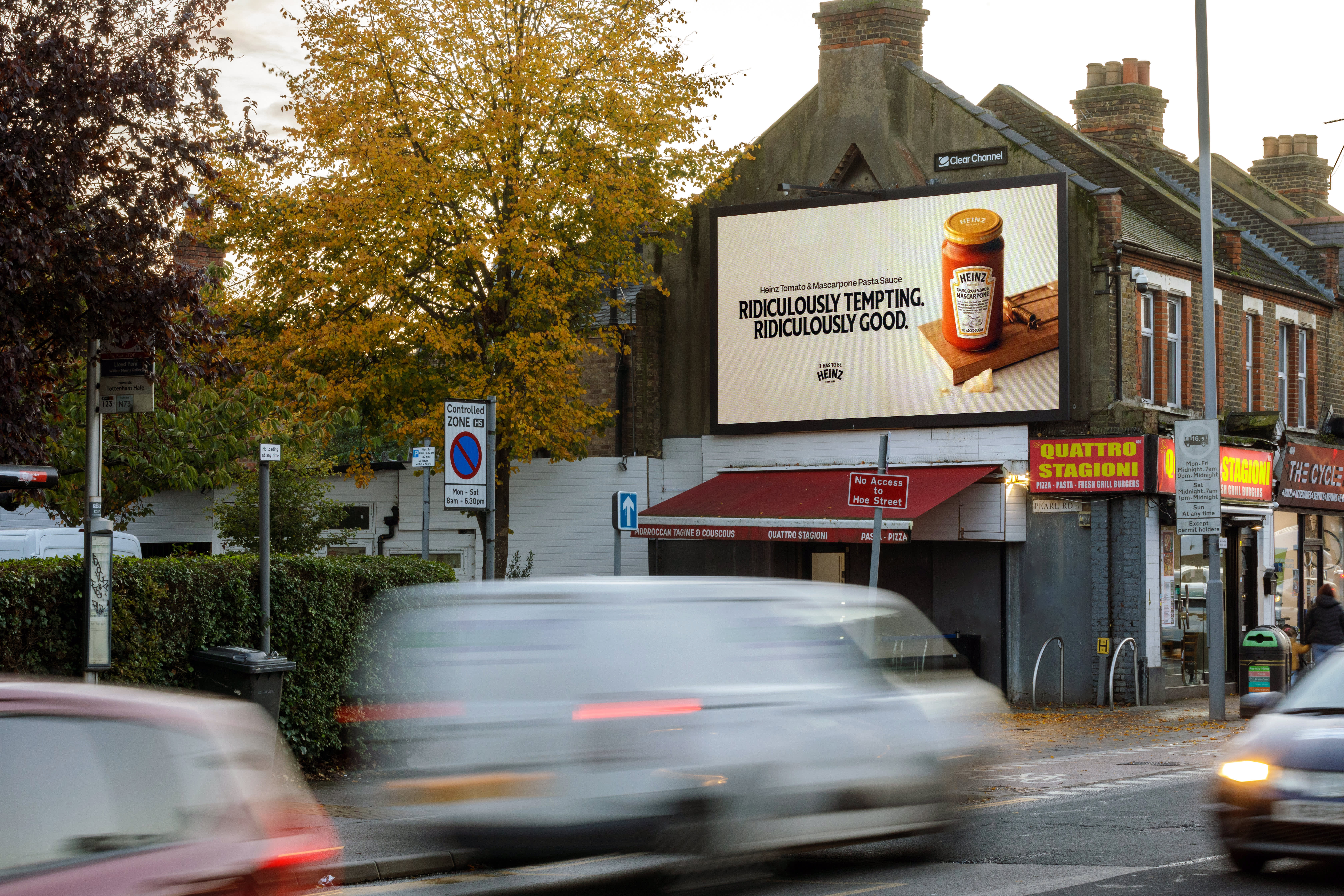 A Billboard live screen with an advertainment of a Heinz campaign.