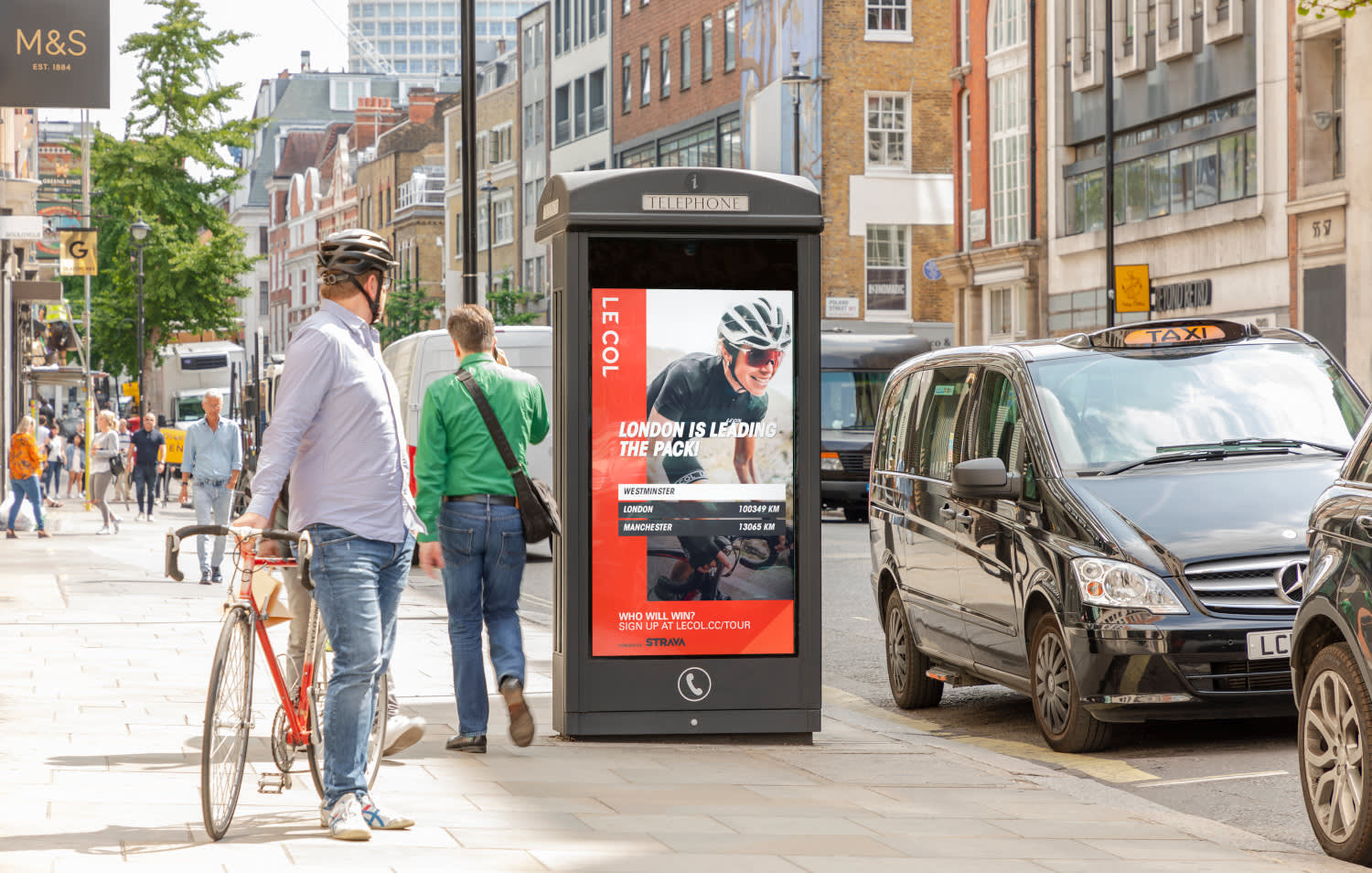 Digital phone box screen outside M&S Le Col ad