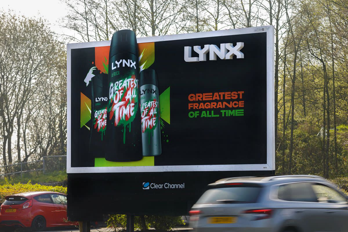 Large Clear Channel billboard showing Lynx ad