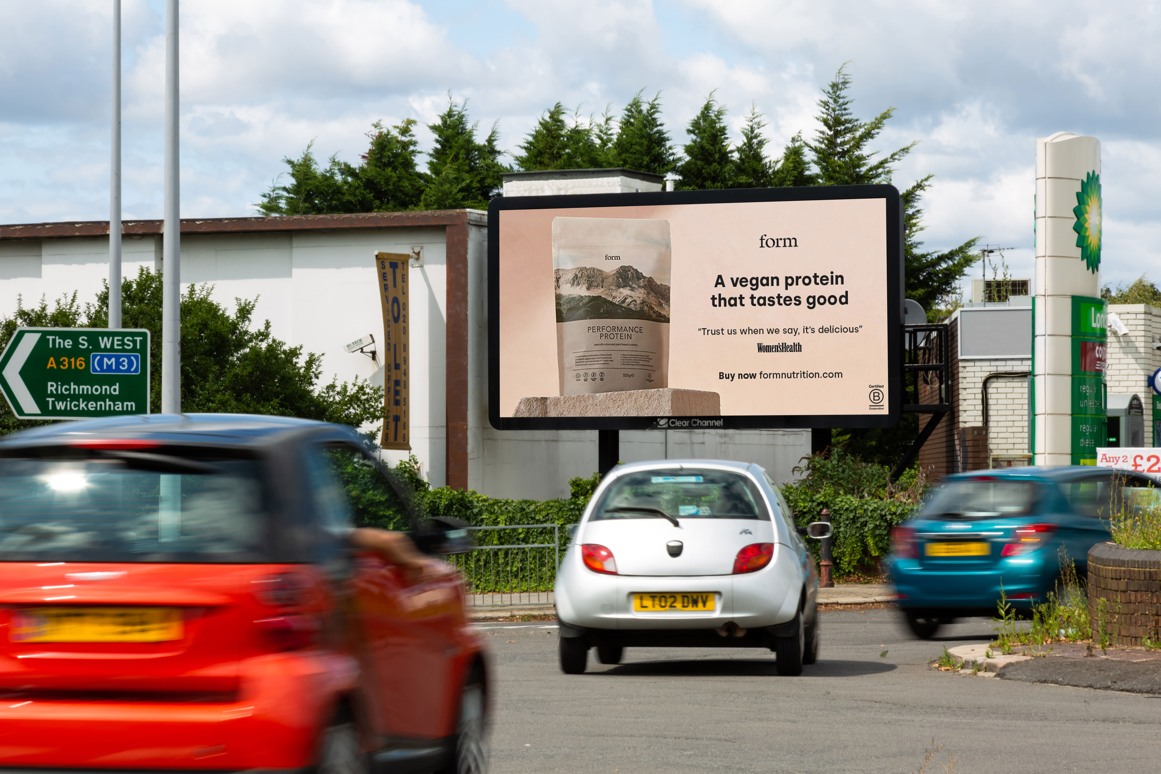 Clear Channel Billboard Live screen showing ad for Form performance protein