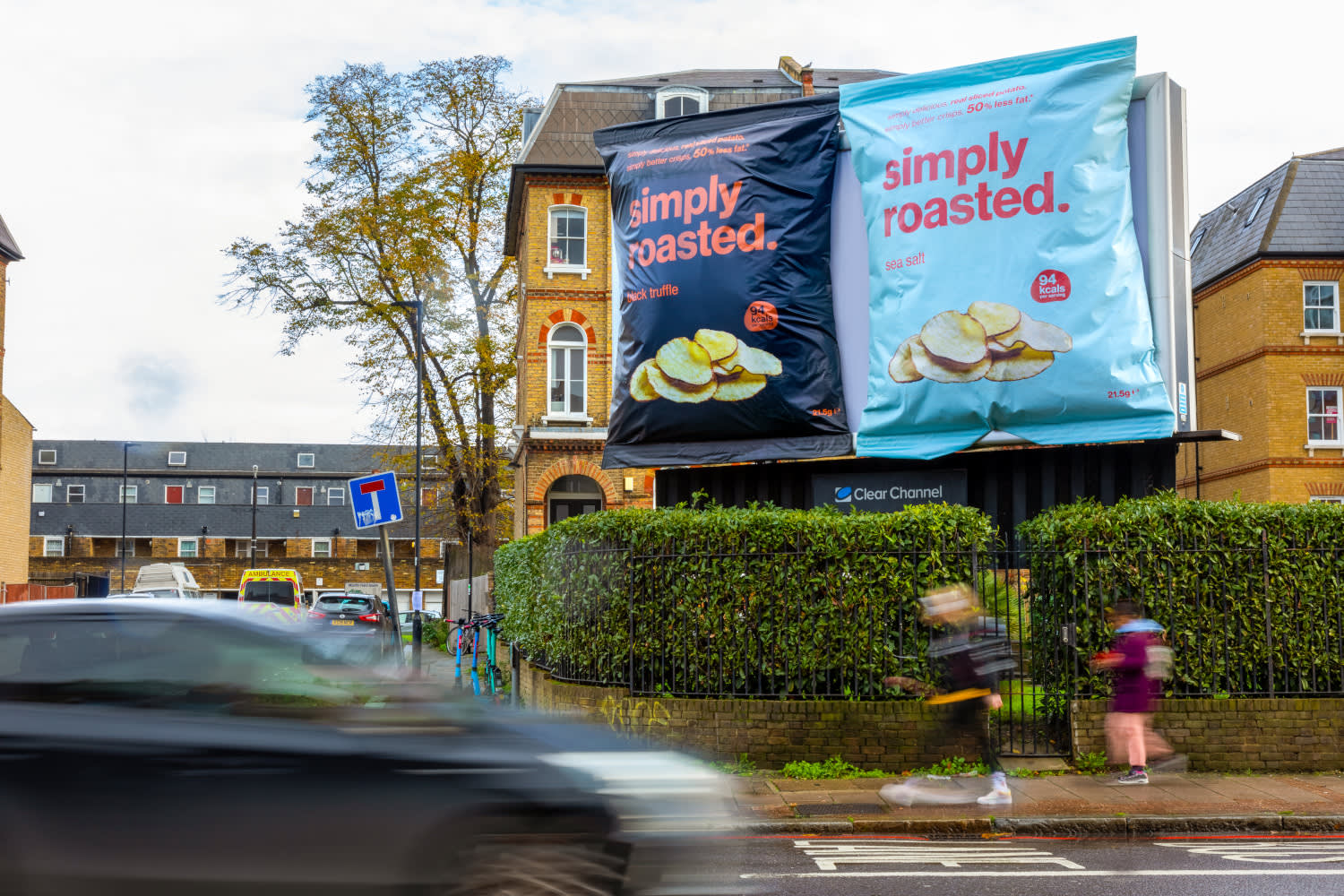 Clear Channel special build billboard showing two large packets of Simply roasted crisps
