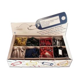 Toonbankdisplay met assortiment van 200 sleutelhangplaatjes 1956 img