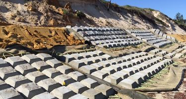 Residents had to give up their beach to build a seawall to protect their homes
. Credit: ABC