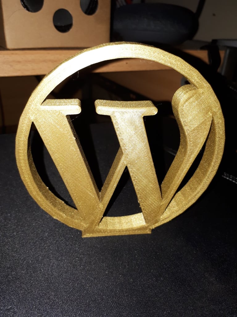 WordPress logo 3d printed in Gold filament