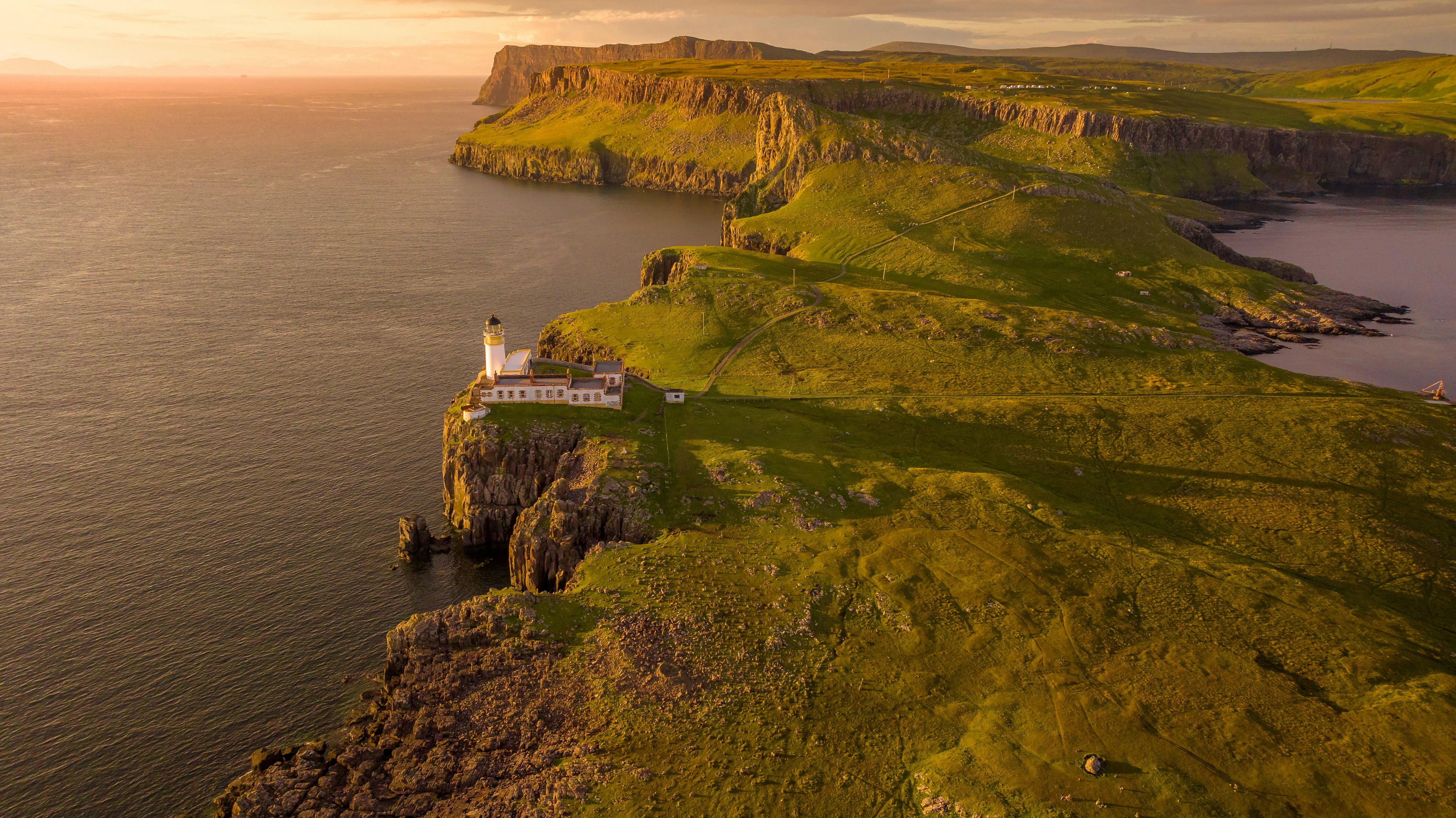Golden hour with a breathtaking house on a cliff