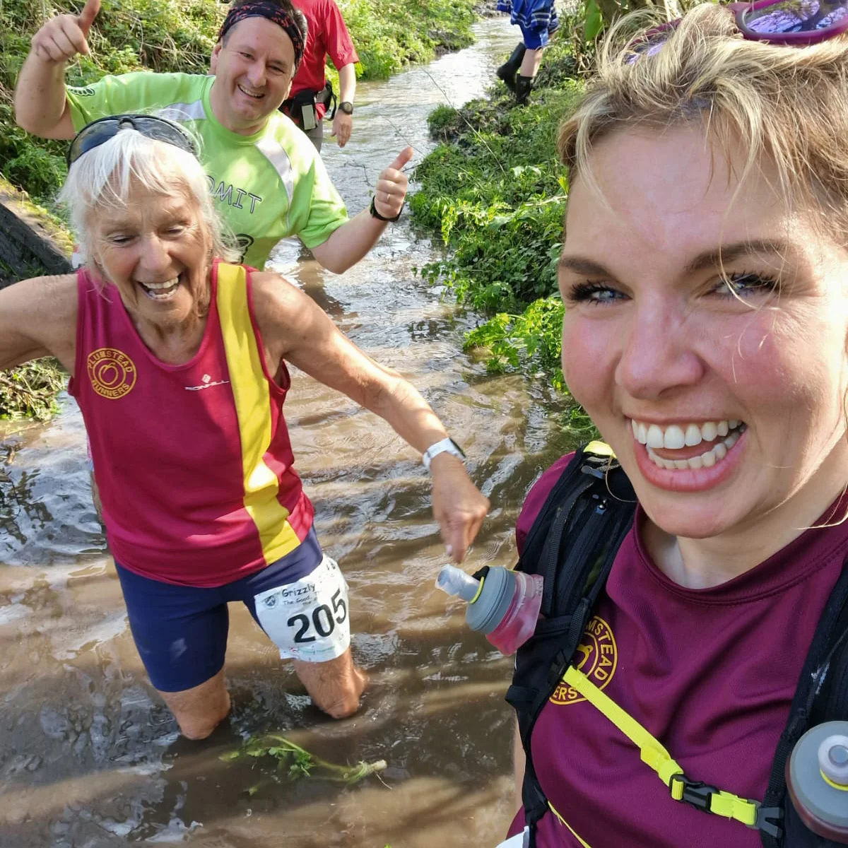 Gina and Vikki in a muddy stream