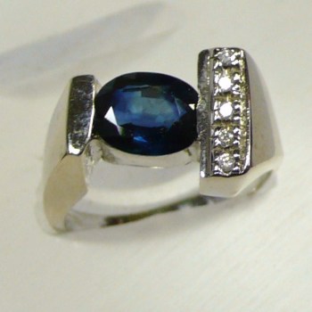 1.50 Carat Blue Oval Sapphire & Diamonds in a Modern A-Symmetrical Design White Gold Ring