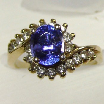 Oval Tanzanite with Diamond Yellow Gold Ring