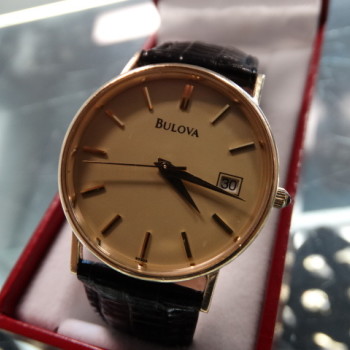 14K BULOVA A3 WRISTWATCH WITH LEATHER BAND