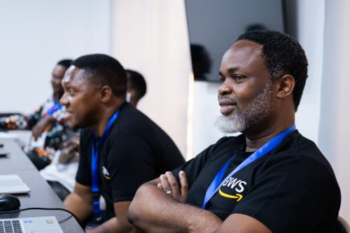 Attendees smiling at the CTO Roundtable in Nigeria.