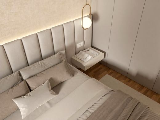 King bed with an upholstered headboard