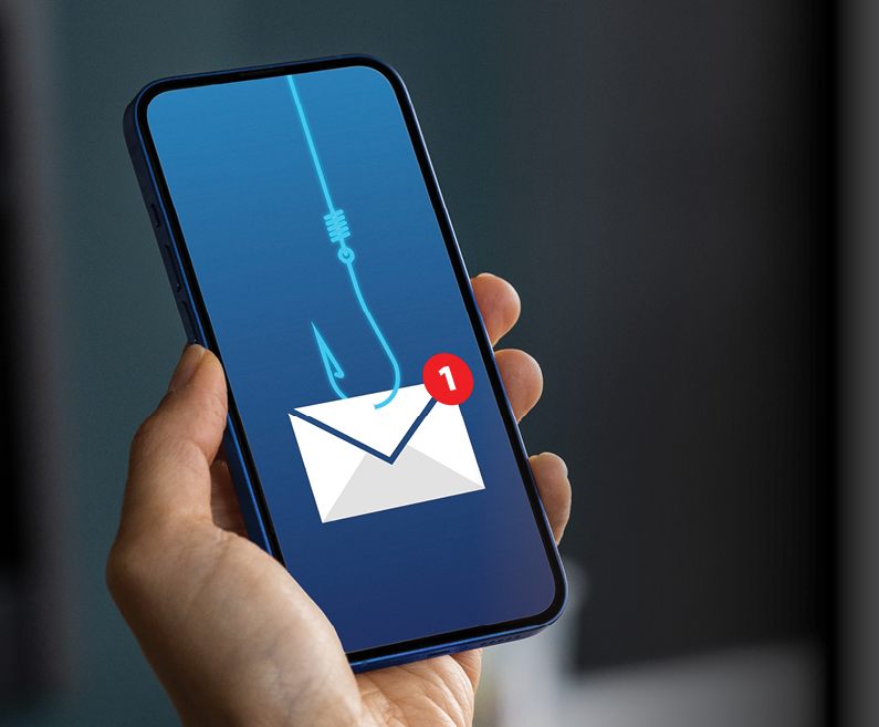A mobile phone with a screen on which an envelope is attached to a hook.
