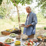 man cooking outside