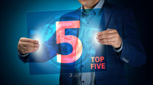 man holding top 5 sign