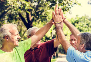 support group high fiving