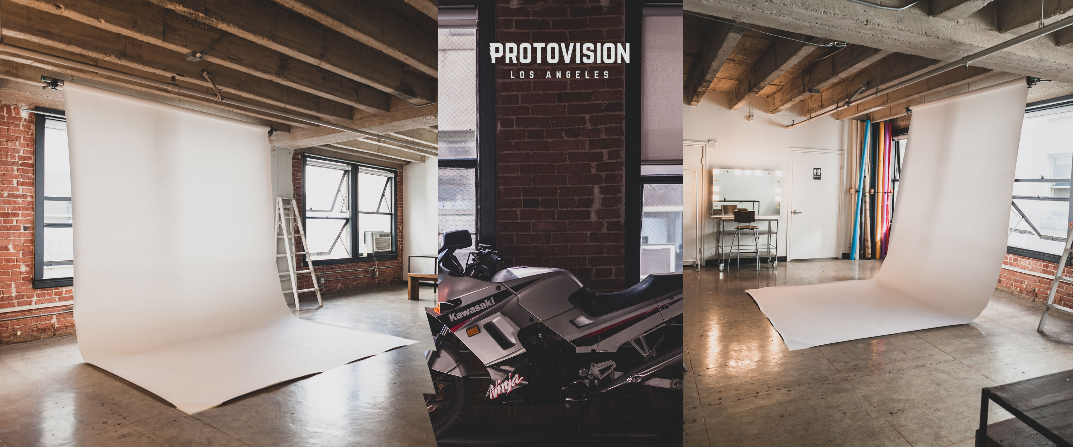 A video shoot is underway in a spacious room with several crew members setting up equipment and adjusting lighting.