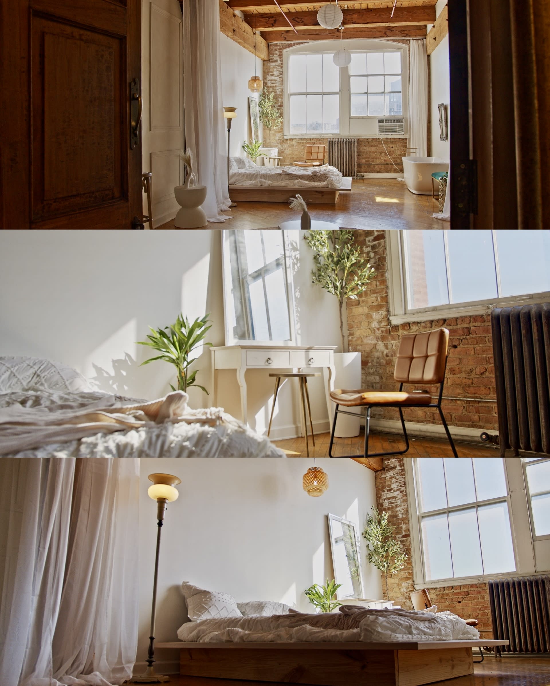 A person sits in a white bathtub against a backdrop of a wooden floor and indoor plants during a video shoot.