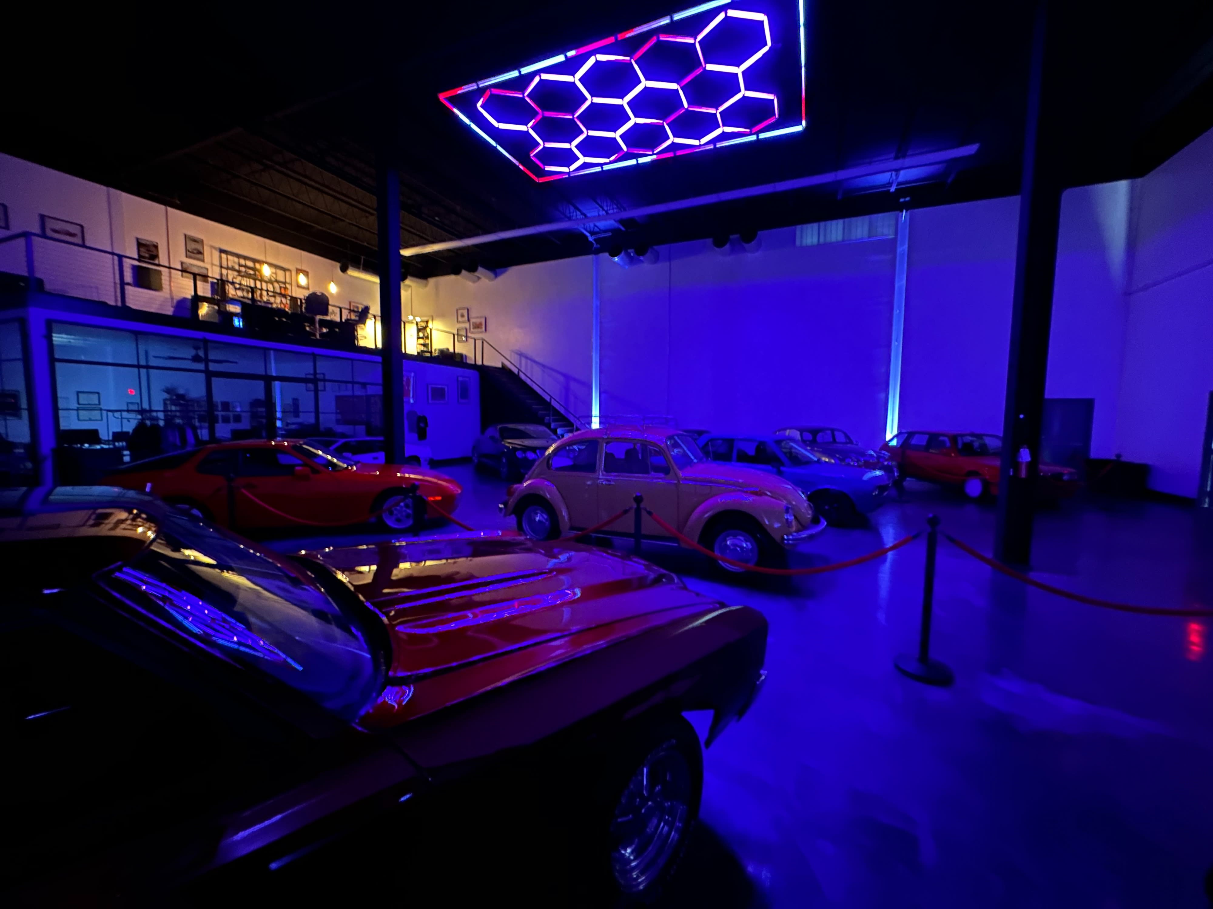 A dealer stands at a craps table, ready to engage participants in a fundraising casino event.