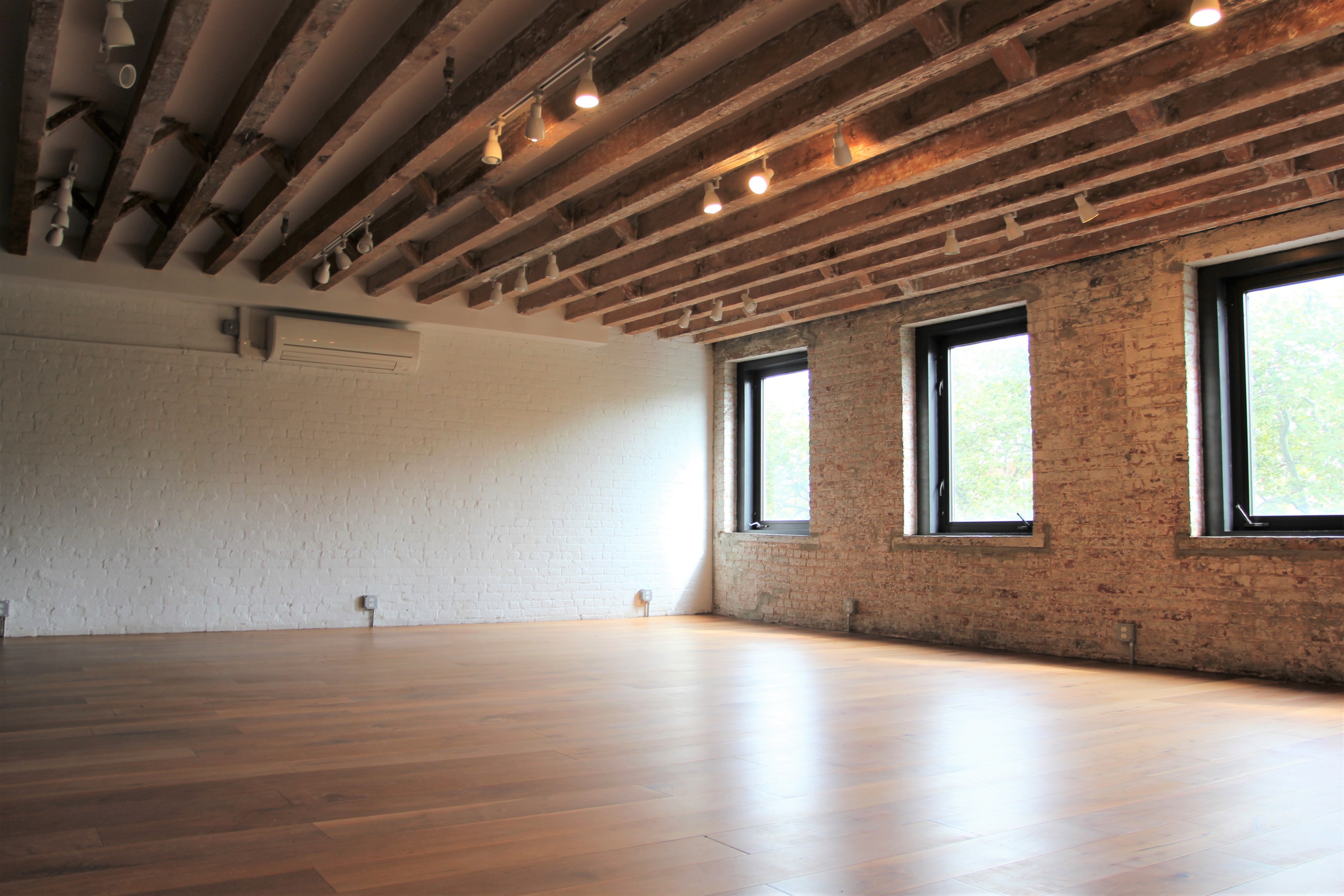 Conveniently-located Studio with Exposed Brick & Park Views in LES, New York,  NY | Production | Peerspace