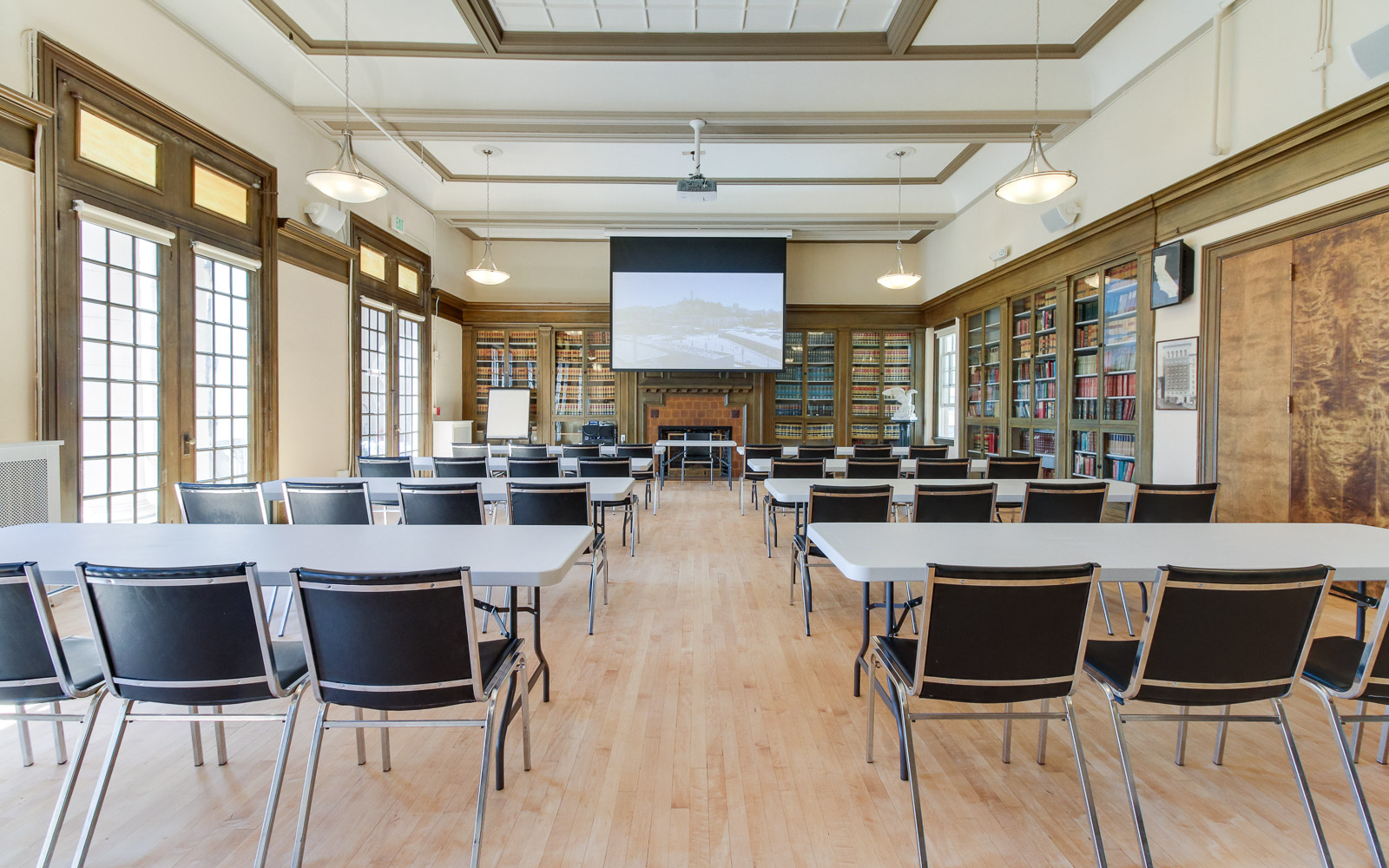 The image shows a workshop setting with a large illuminated display spelling "ALL STAR" in front of a screen presenting information on content and connections.