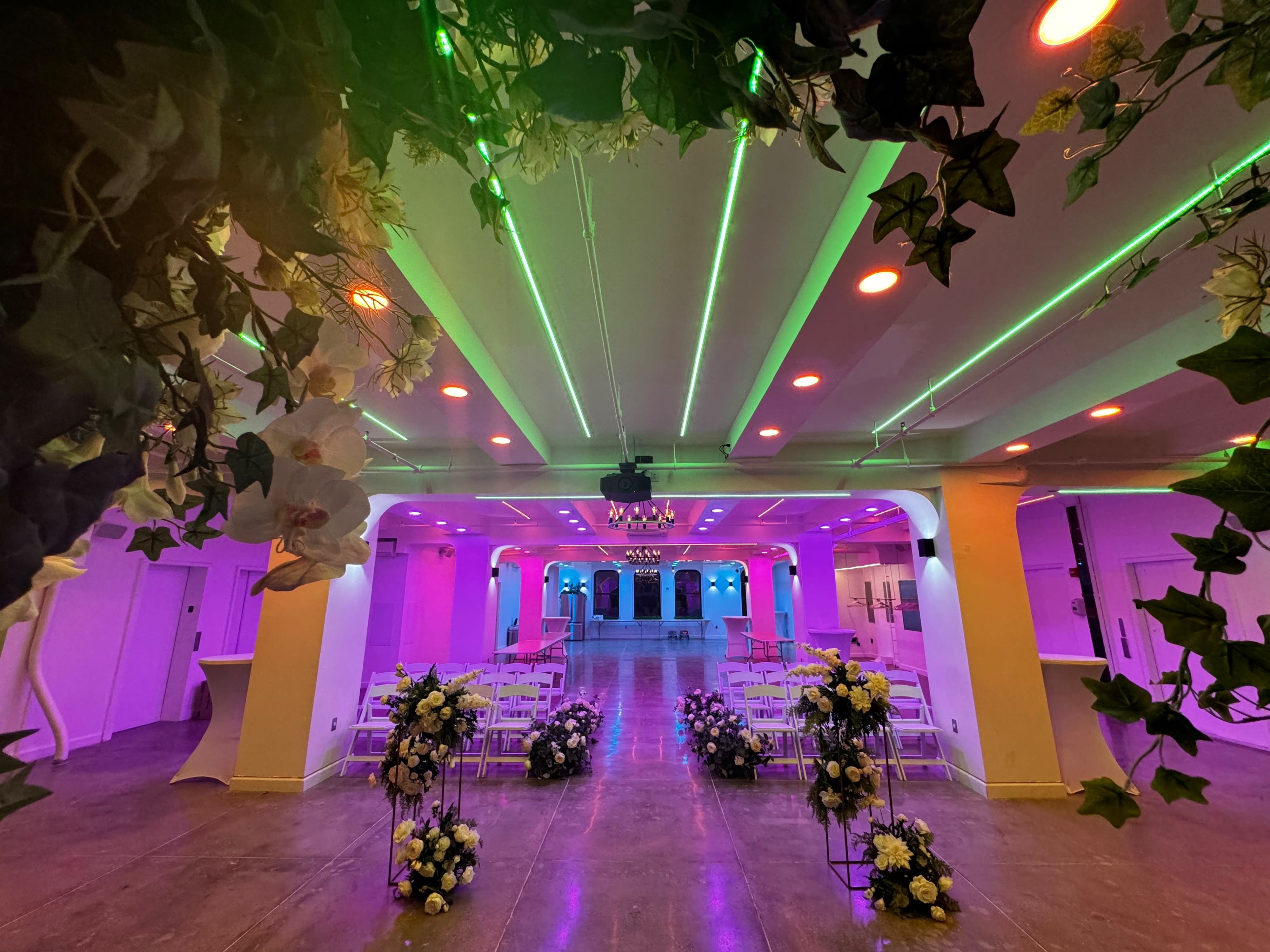 A couple shares a joyful moment on the dance floor at their wedding reception.