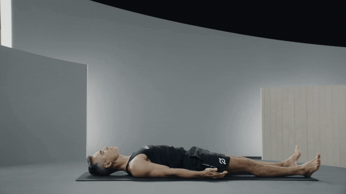 Peloton instructor Ross Rayburn demonstrates Bridge Pose in yoga for core strength