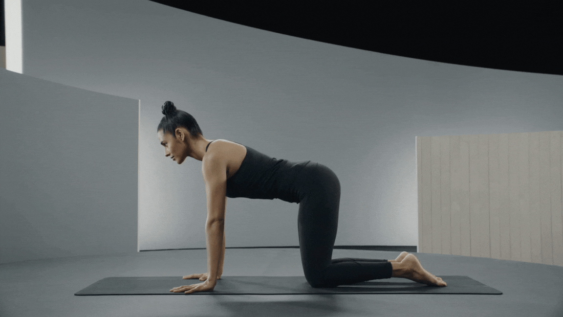 Peloton instructor Aditi Shah demonstrates Pigeon Pose as an easy yoga pose.