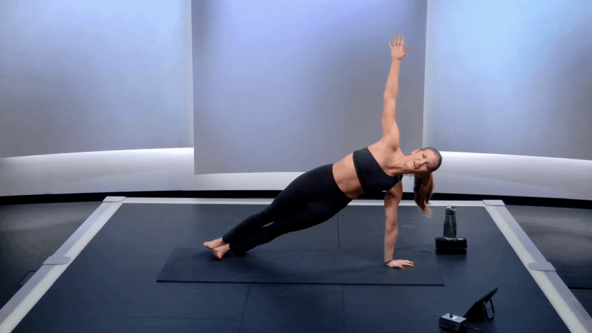 Peloton instructor Rebecca Kennedy demonstrates a high side plank with proper form during a Peloton core strength class