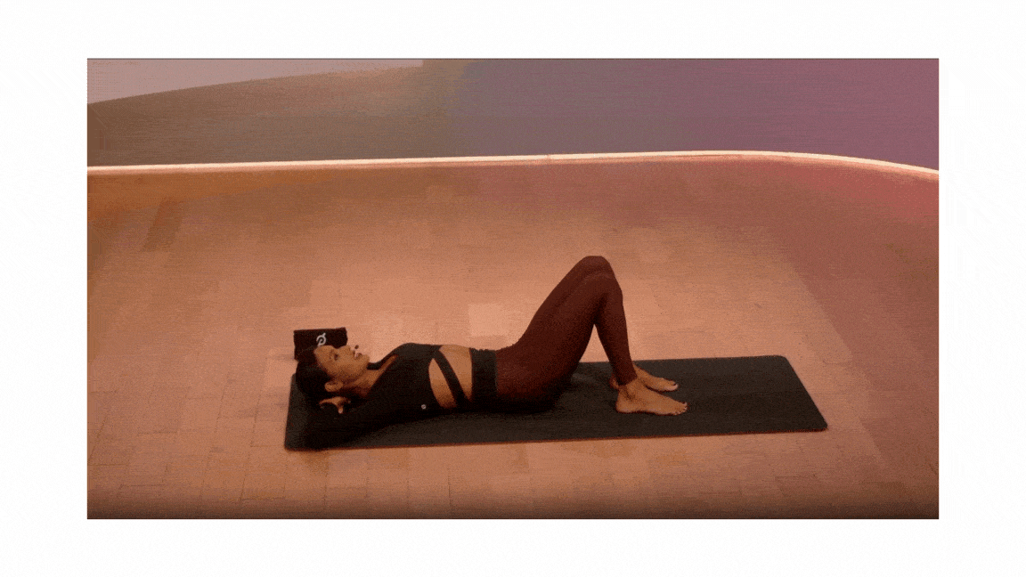Aditi Shah performs toe taps in Pilates class