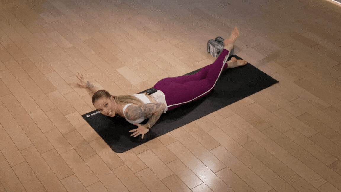 Peloton instructor Kirra Michel demonstrates a variation of the scorpion stretch.