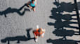 Overhead shot of runners racing a half marathon and preparing for post-half marathon recovery.