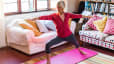 Woman practices yoga at home 