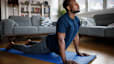 Man doing at-home yoga for his lower back.