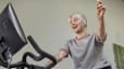 Woman cycles on a Peloton Bike
