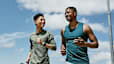 Two men jogging outside