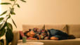 Woman resting on couch