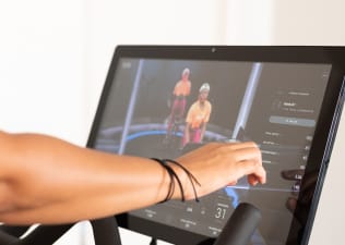 7 Tips and Tricks for Working Out with Peloton at a Hotel Gym