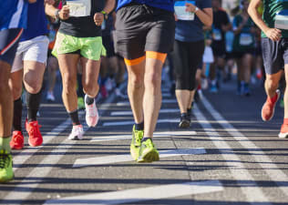 Photo of people running marathon race