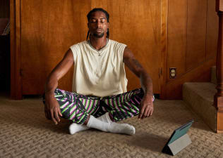 Man doing indoor meditation