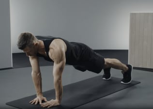 Andy Speer demonstrates a diamond push-up exercise