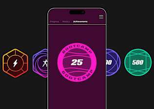 Peloton milestone badges displayed on a phone screen