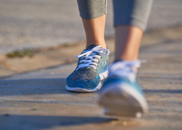 Closeup shot of sneakers walking