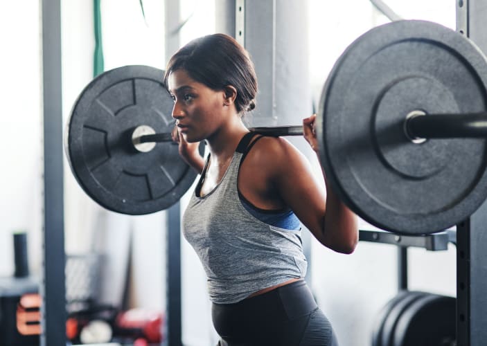 Woman lifting barbell