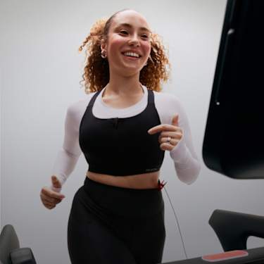Women running on Peloton Tread