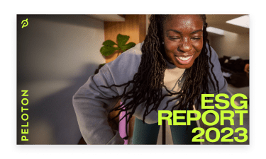  Cover page of Peloton’s 2023 ESG Report featuring a Peloton member smiling while riding a Bike and the text “Peloton ESG Report 2023” 