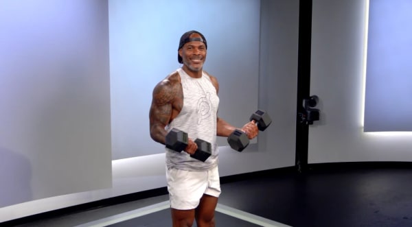 Adrian Williams lifting weights