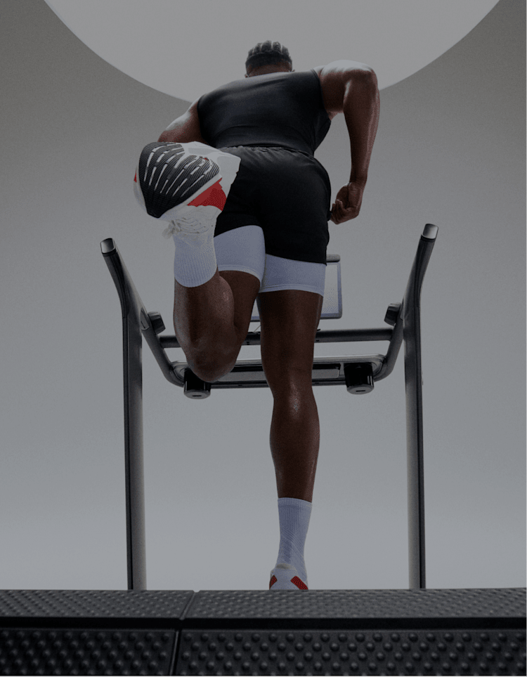 Man running on Peloton Tread+